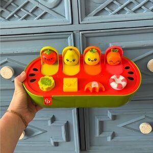 Fisher-Price tropical fruit pop-up toy peekaboo
